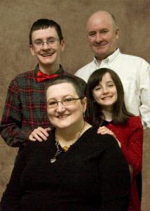 Shelly and her Family. From left to right: Austin (son), Brian (husband) and Carissa (daughter)