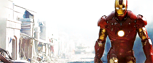 Iron Man walking away from explosion
