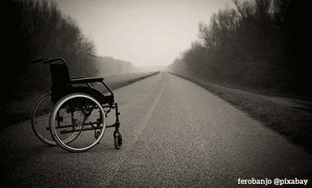 wheelchair in lonely street