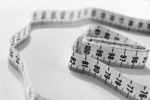 Measuring tape can measure height. Vosoritide is shown to increase height in patients with achondroplasia.
