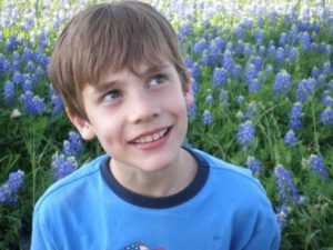 Charles has Phelan-McDermid syndrome. Here he is at 10 years old