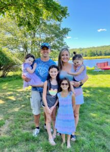 Lisa Superina and her husband with their four children. Two of their daughters have Schwachman-Diamond syndrome.