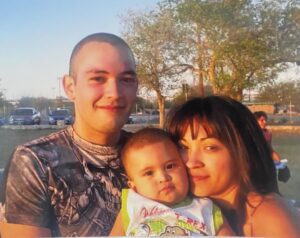 Cristina, her husband, and their son Isaiah, who passed away due to GA-1