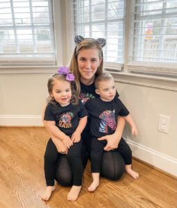 Sierra and her kids, one of whom has WABS, wearing their rare disease gear