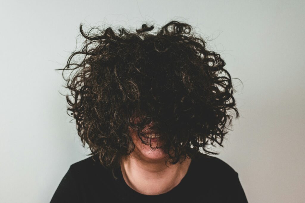 Boy with Giant Axonal Neuropathy (GAN) Celebrates Curly Hair Day at School