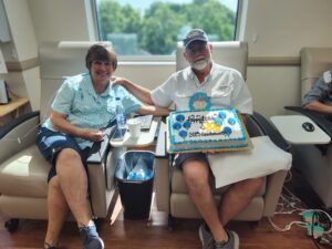 Carl, who has idiopathic multicentric Castleman disease (iCMD), and his wife, who has cancer, as they celebrate a treatment milestone